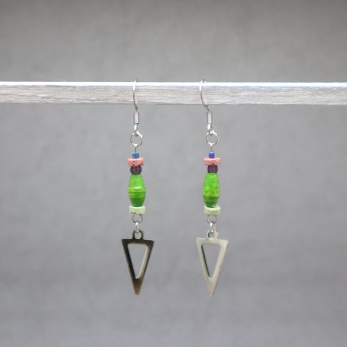Pair of earrings with green beads and triangle charms on a gray background, paper bers from Ouganda with silver stainless steel
