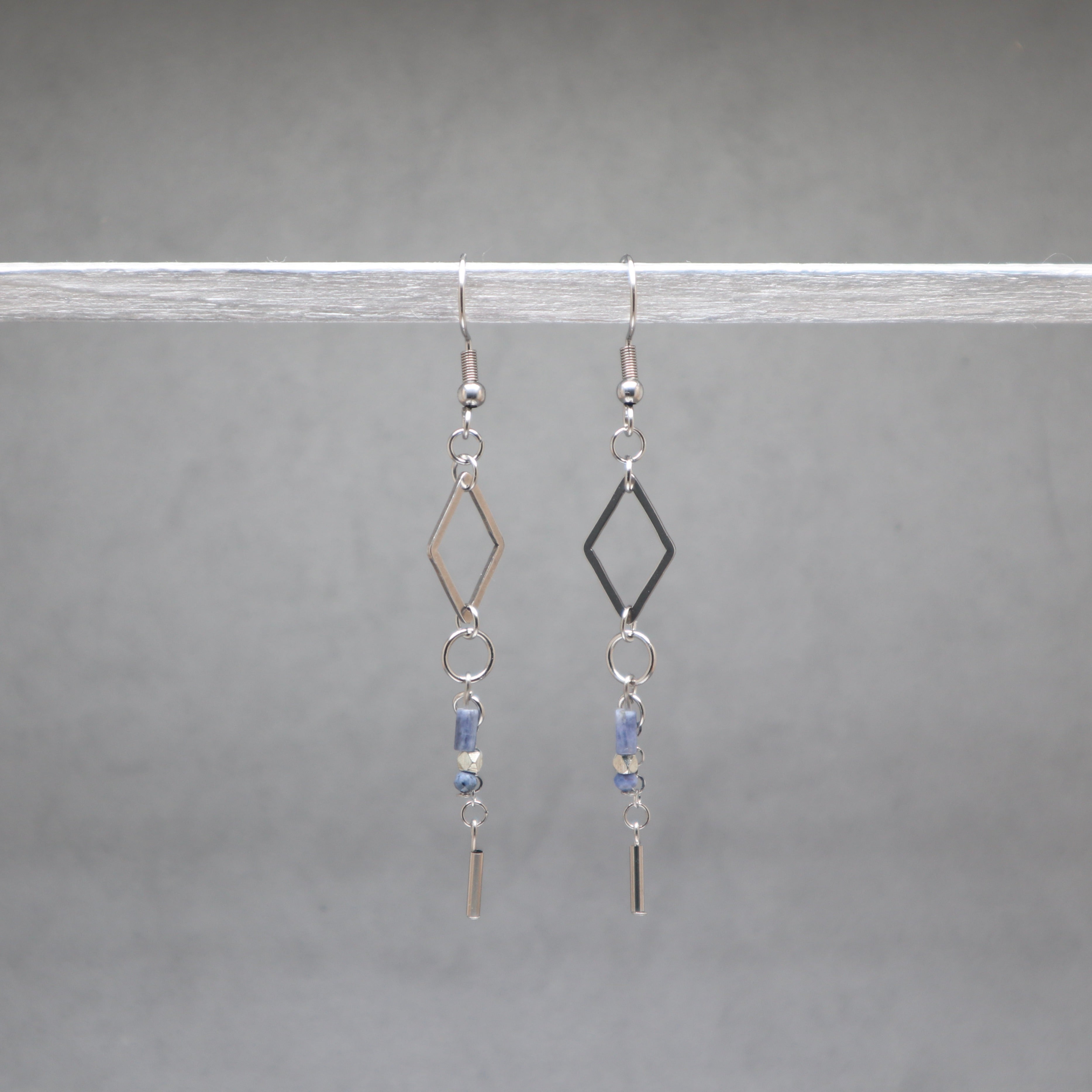 Stainless steel silver diamond shape with sodalite blue gemstone and metal