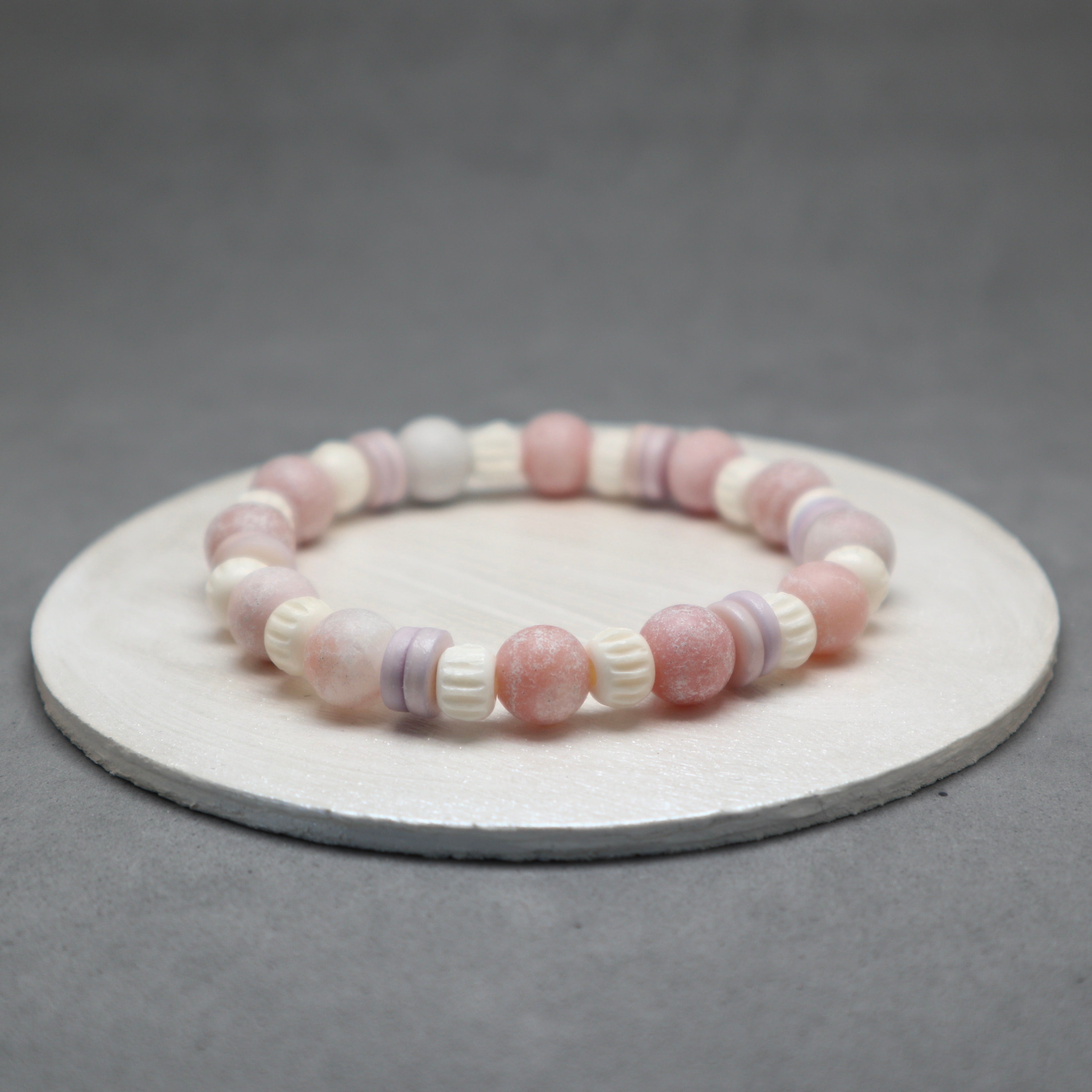 opal bracelet with purple button bone and bone carved