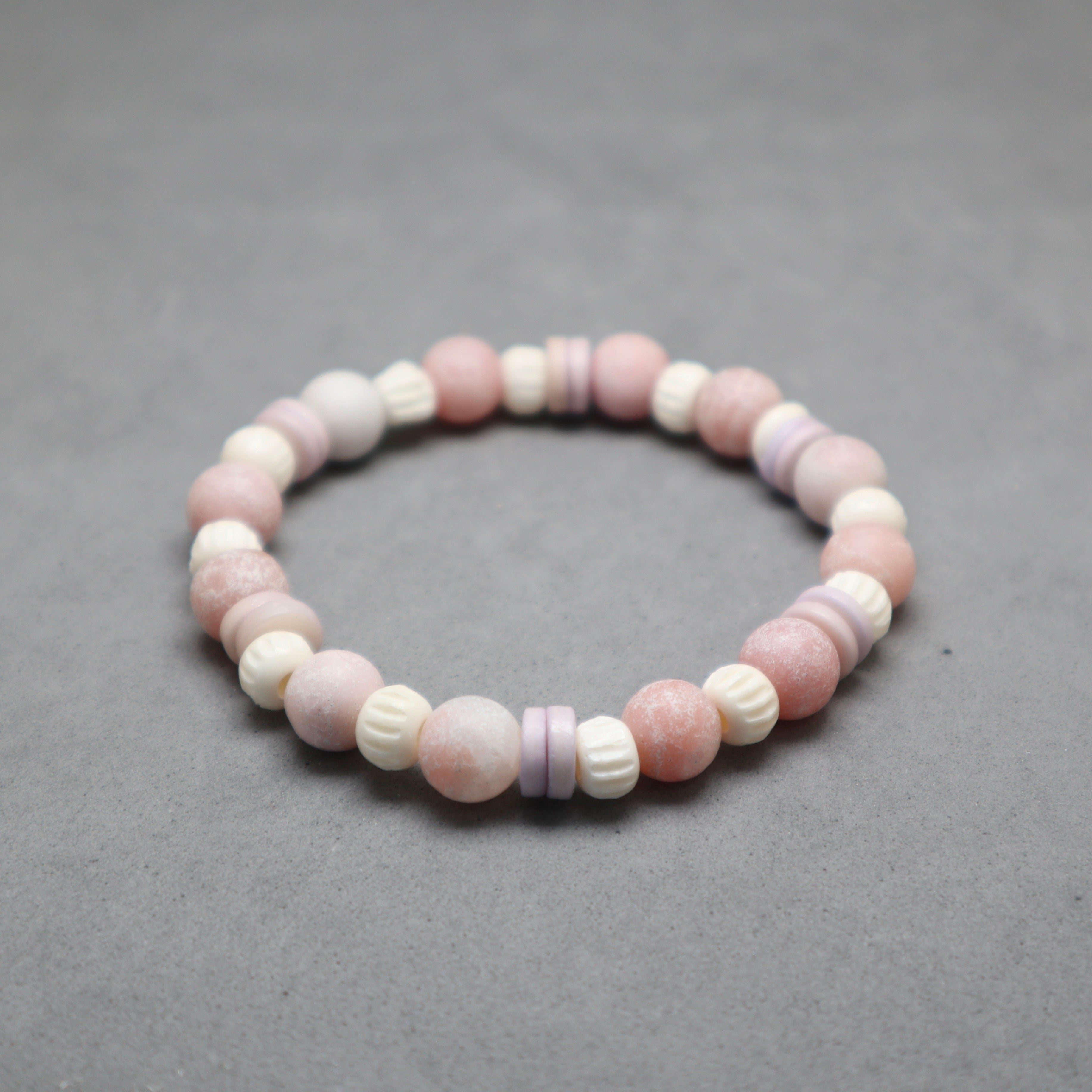 opal bracelet with purple button bone and bone carved